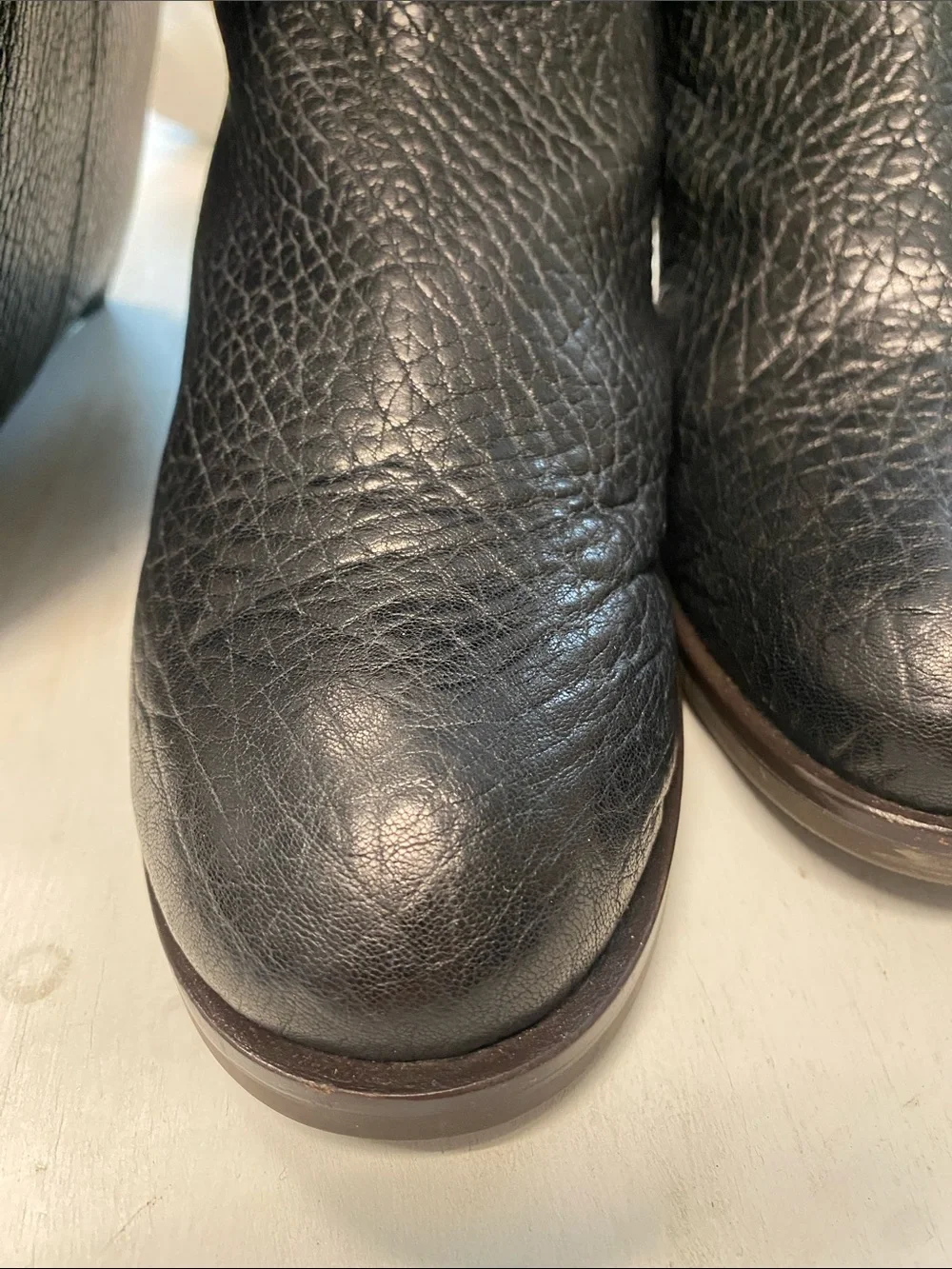 Tory Burch black pebbled knee-high riding boots